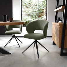 Stella - 360° Self Returning Swivel Chair in a Green Boucle Fabric with Black Legs (Single)