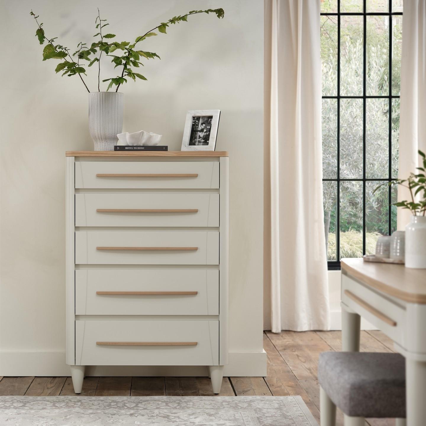 As summer fades, let the Larsen 5-Drawer Chest keep your cosy essentials within reach. Embrace the se...